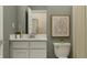 Clean bathroom featuring a single vanity, white cabinets, white countertop, and modern decor at 624 Bridgeman Rd, Avon, IN 46123