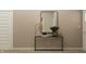 Inviting entryway with console table, decorative mirror, and modern lamp, creating a stylish first impression at 624 Bridgeman Rd, Avon, IN 46123