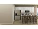 Contemporary kitchen with stainless steel appliances, an island with seating, and sleek cabinetry at 624 Bridgeman Rd, Avon, IN 46123