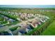 An attractive aerial view of a suburban neighborhood with manicured lawns, mature trees, and inviting homes at 710 Monarch Ln, Lebanon, IN 46052