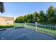 Outdoor patio area and verdant backyard with green trees, perfect for outdoor enjoyment and privacy at 710 Monarch Ln, Lebanon, IN 46052
