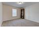 Neutral bedroom features a window for natural light and a bookshelf at 710 Monarch Ln, Lebanon, IN 46052