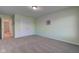 Bedroom with light green walls and carpeted floors at 710 Monarch Ln, Lebanon, IN 46052
