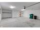Spacious garage with ample lighting and storage space, ready for vehicles and projects at 710 Monarch Ln, Lebanon, IN 46052