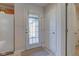 Bright mud room featuring a door with privacy glass and a closet at 710 Monarch Ln, Lebanon, IN 46052