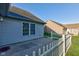 Back patio featuring fenced yard and clear skies, providing privacy and outdoor relaxation at 710 Monarch Ln, Lebanon, IN 46052