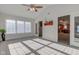 Inviting sunroom offers views of the kitchen and sliding door access at 710 Monarch Ln, Lebanon, IN 46052