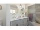 Stylish bathroom features a double vanity, sleek lighting, and elegant marble-style shower at 7310 W 100 N, Greenfield, IN 46140