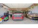 Spacious garage interior featuring ample storage and a parked vehicle at 7310 W 100 N, Greenfield, IN 46140