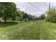 A large backyard with a well-maintained lawn and a storage shed at 7702 Mary Ln, Indianapolis, IN 46217