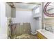 Bathroom in need of renovation, showing sink, mirror, and wall damage at 7702 Mary Ln, Indianapolis, IN 46217
