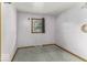 Bedroom with pink walls and carpet floors needing remodeling at 7702 Mary Ln, Indianapolis, IN 46217