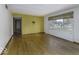 Open concept living room with beautiful hardwood floors and natural light at 7702 Mary Ln, Indianapolis, IN 46217