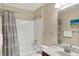 Clean bathroom with a combined shower and tub, a striped shower curtain, and mirrored vanity at 8120 Glenwillow Ln # 206, Indianapolis, IN 46278
