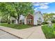 Attractive community building featuring well-maintained landscaping and inviting entrances at 8120 Glenwillow Ln # 206, Indianapolis, IN 46278
