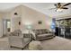 Comfortable living area with plush seating, stylish decor, and natural light streaming in from the patio at 8120 Glenwillow Ln # 206, Indianapolis, IN 46278
