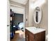 This bathroom features a vanity with a modern sink and mirror at 831 Wakulla Ct, Indianapolis, IN 46217