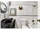 Elegant bathroom with subway tile, custom vanity, and modern fixtures at 831 Wakulla Ct, Indianapolis, IN 46217