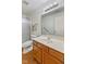 Bathroom featuring a shower with sliding glass doors and an oak vanity at 8451 Sunningdale Blvd, Indianapolis, IN 46234