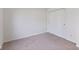 Bedroom with neutral carpet and a double door closet at 8451 Sunningdale Blvd, Indianapolis, IN 46234