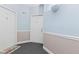 Building hallway with neutral walls and carpet, showing access to multiple units at 8720 Yardley Ct # 100, Indianapolis, IN 46268