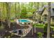 Beautiful backyard featuring a refreshing in-ground pool and a stone pathway at 9312 Sullivan Pl, Zionsville, IN 46077