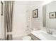 Cozy bathroom features white subway tile and a shower-tub combo with gray patterned shower curtain at 9386 Abner St, McCordsville, IN 46055