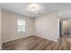The bedroom features new flooring, neutral paint, and ample natural light at 9454 W Canoe Trl, Pendleton, IN 46064