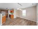 The dining area features new flooring, neutral paint, and a view of the backyard at 9454 W Canoe Trl, Pendleton, IN 46064