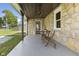 Charming front porch features stone accents, providing a relaxing outdoor seating area at 997 Yandes St, Franklin, IN 46131