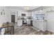 Bright kitchen with white cabinets, stainless steel appliances, and modern countertops at 997 Yandes St, Franklin, IN 46131