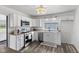 Bright kitchen with white cabinets, stainless steel appliances, and modern countertops at 997 Yandes St, Franklin, IN 46131