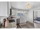 Bright kitchen with white cabinets, stainless steel appliances, and modern countertops at 997 Yandes St, Franklin, IN 46131