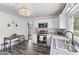 Bright kitchen with white cabinets, stainless steel appliances, and modern countertops at 997 Yandes St, Franklin, IN 46131
