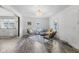 Spacious living room with hardwood floors and stylish seating flows into the bright kitchen at 997 Yandes St, Franklin, IN 46131