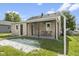 Charming home featuring a stone exterior and covered patio, perfect for outdoor living and entertaining at 997 Yandes St, Franklin, IN 46131