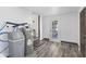 Large utility room with water heater, water softener, and access to a private yard at 997 Yandes St, Franklin, IN 46131
