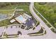 Aerial view of homes with manicured lawns, tree-lined streets in a well-planned community at 1013 Domino Dr, Carmel, IN 46032