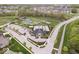 Aerial view of a community featuring pool, clubhouse, tennis courts, playground and park at 1013 Domino Dr, Carmel, IN 46032