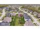 An aerial view of a residential neighborhood, highlighting the diverse architecture and well-maintained yards at 1013 Domino Dr, Carmel, IN 46032