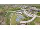 Aerial view of neighborhood featuring clubhouse, pool, tennis courts and playground at 1013 Domino Dr, Carmel, IN 46032