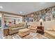 Spacious finished basement featuring comfortable seating arrangements and decor at 1013 Domino Dr, Carmel, IN 46032