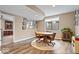 Finished basement showcasing a small table and chairs, plus an area for a small library at 1013 Domino Dr, Carmel, IN 46032