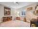Finished basement with a small window, carpet floors, and shelving at 1013 Domino Dr, Carmel, IN 46032