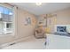 Bright bedroom with custom wall decals and lots of natural light at 1013 Domino Dr, Carmel, IN 46032