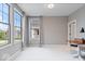 Bright bedroom features large windows with views of the outdoors and neutral carpeting for comfort at 1013 Domino Dr, Carmel, IN 46032