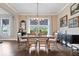 Formal dining room featuring large windows and traditional decor at 1013 Domino Dr, Carmel, IN 46032
