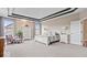 Spacious main bedroom boasts tray ceiling, plush carpet, and large windows for ample natural light at 1013 Domino Dr, Carmel, IN 46032