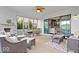 Covered patio with plenty of room for outdoor dining and relaxing with a fireplace at 1013 Domino Dr, Carmel, IN 46032