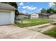 Fenced backyard with grassy lawn, providing a secure and spacious outdoor area at 1020 E Sixth St, Greenfield, IN 46140